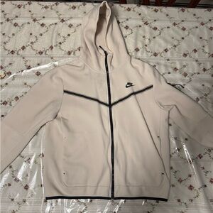 Nike Black and Cream Apparel Tag